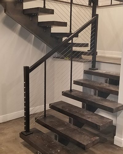 industrial style stairs in basement renovation olathe ks